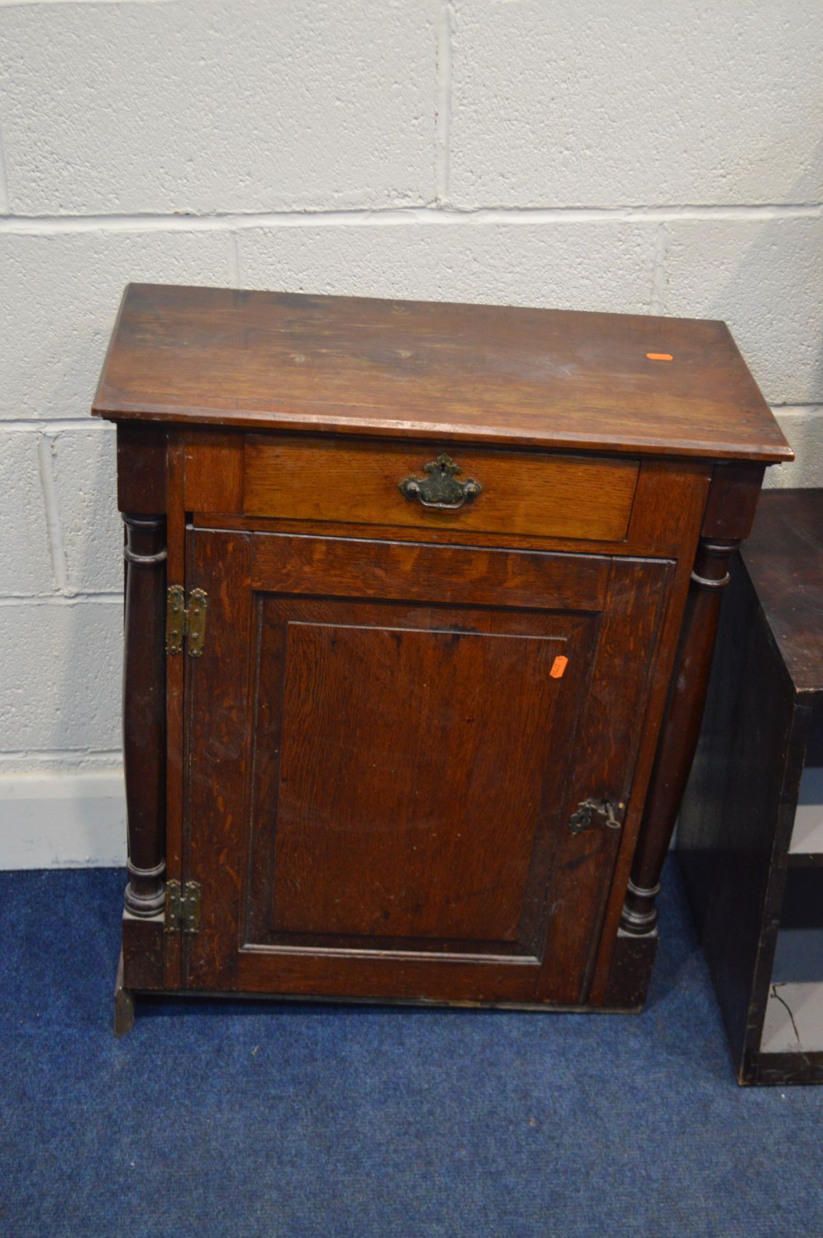 AN EDWARDIAN OAK SINGLE DOOR CABINET with a single drawer (missing plinths) along with a beech - Image 4 of 4