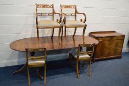 A YEWWOOD DINING SUITE, comprising a twin pedestal table with a single additional leaf, extended