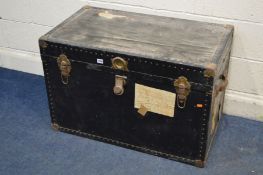 A VINTAGE DARK BLUE TRUNK, with travel labels, width 92cm x depth 52cm x height 60cm