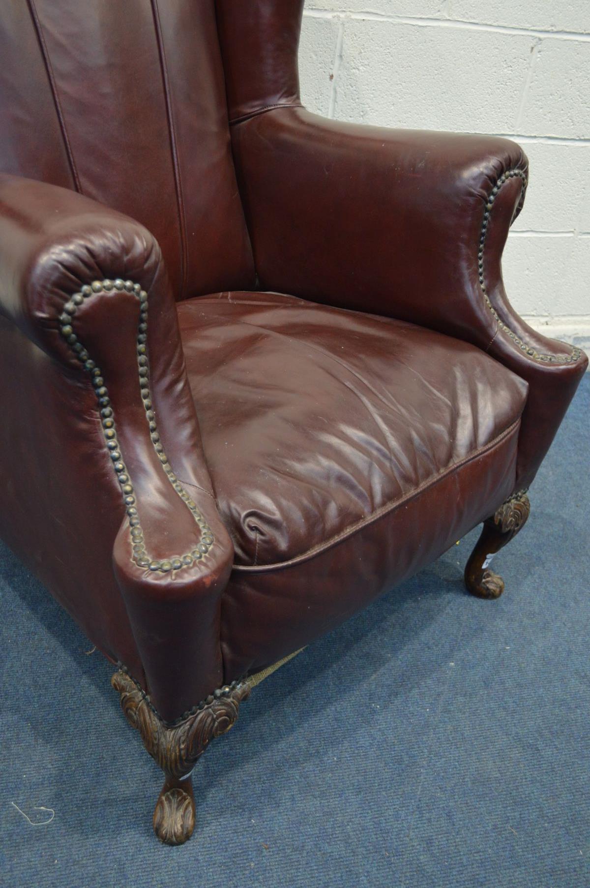 A GEORGE III GENTLEMANS ARMCHAIR, recovered in burgundy faux leather upholstery, sprung seat, on - Image 3 of 5