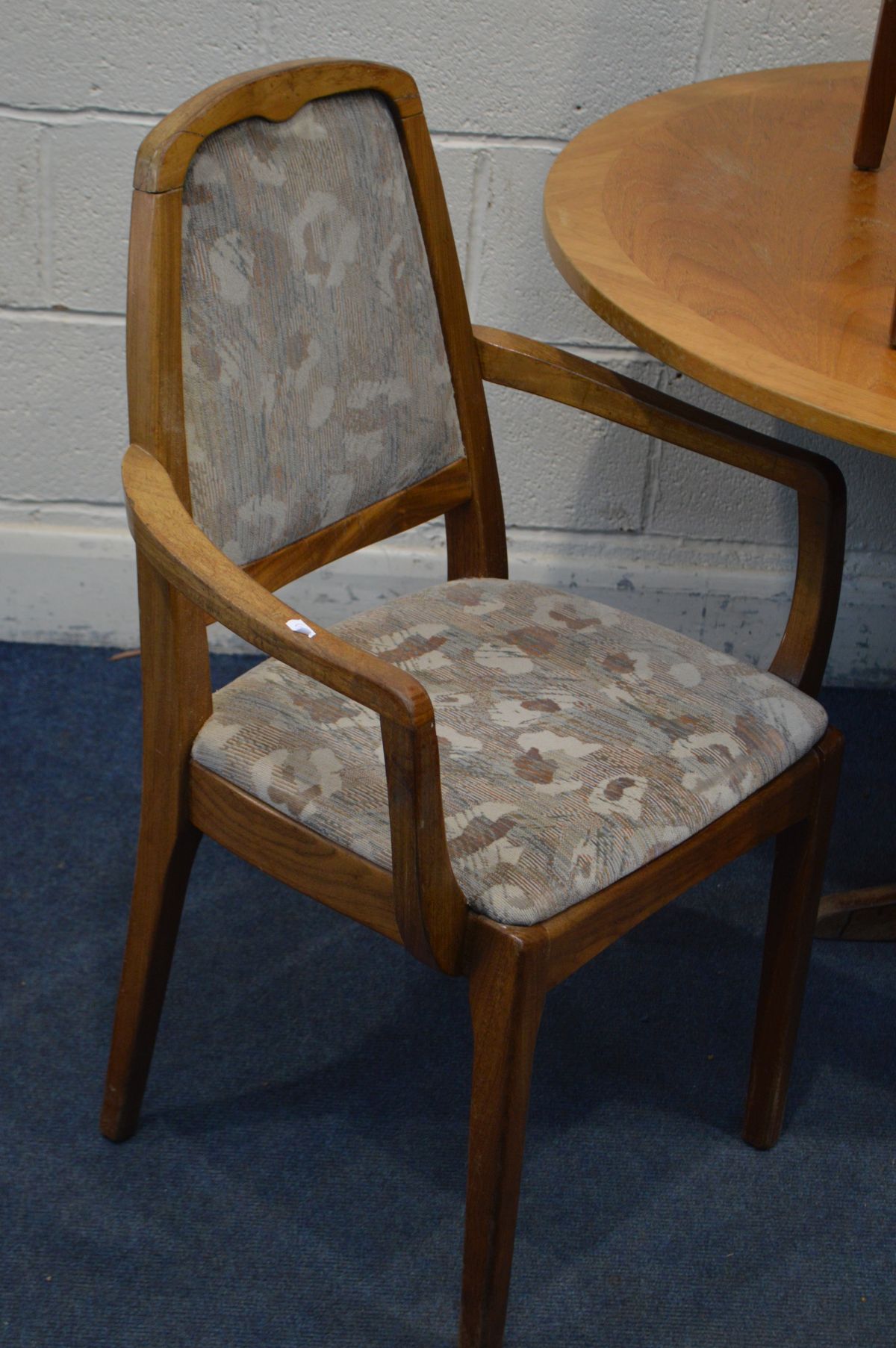 A NATHAN TEAK CIRCULAR EXTENDING DINING TABLE, with one additional fold out leaf, extended length - Image 2 of 3