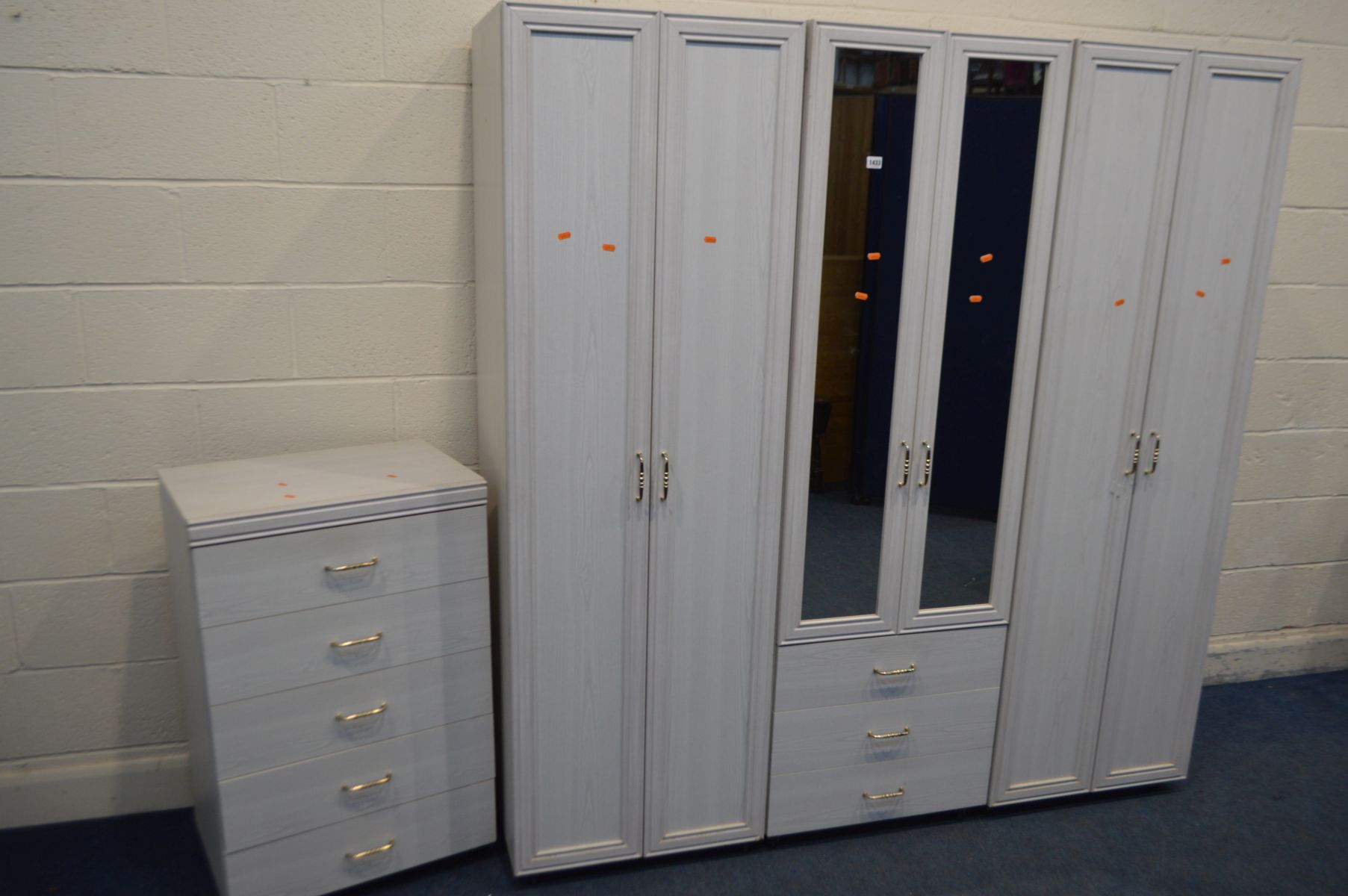 A MODERN WHITE FINISH THREE SECTION WARDROBE, overall width 179cm x width of each section 59cm x
