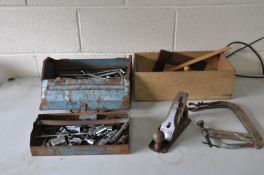 A METAL TOOLBOX AND A WOODEN TRAY containing tools including a Stanley Bailey No 4 wood plane,