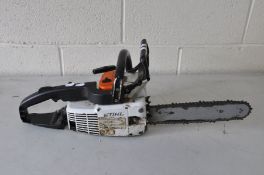 A VINTAGE STIHL 011AV PETROL CHAINSAW with blade protrusion of 11ins (engine tight to pull but no