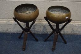 A PAIR OF ORIENTAL BRASS PLANTERS on folding stands and a warming pan (3)