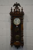 A LATE VICTORIAN GUSTAV BECKER VIENNA WALL CLOCK, with a wooden eagle pediment, the 7 inch dial with