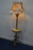 AN EARLY 20TH CENTURY BRASS AND ONYX STANDARD LAMP, with a triple light fitting from converted