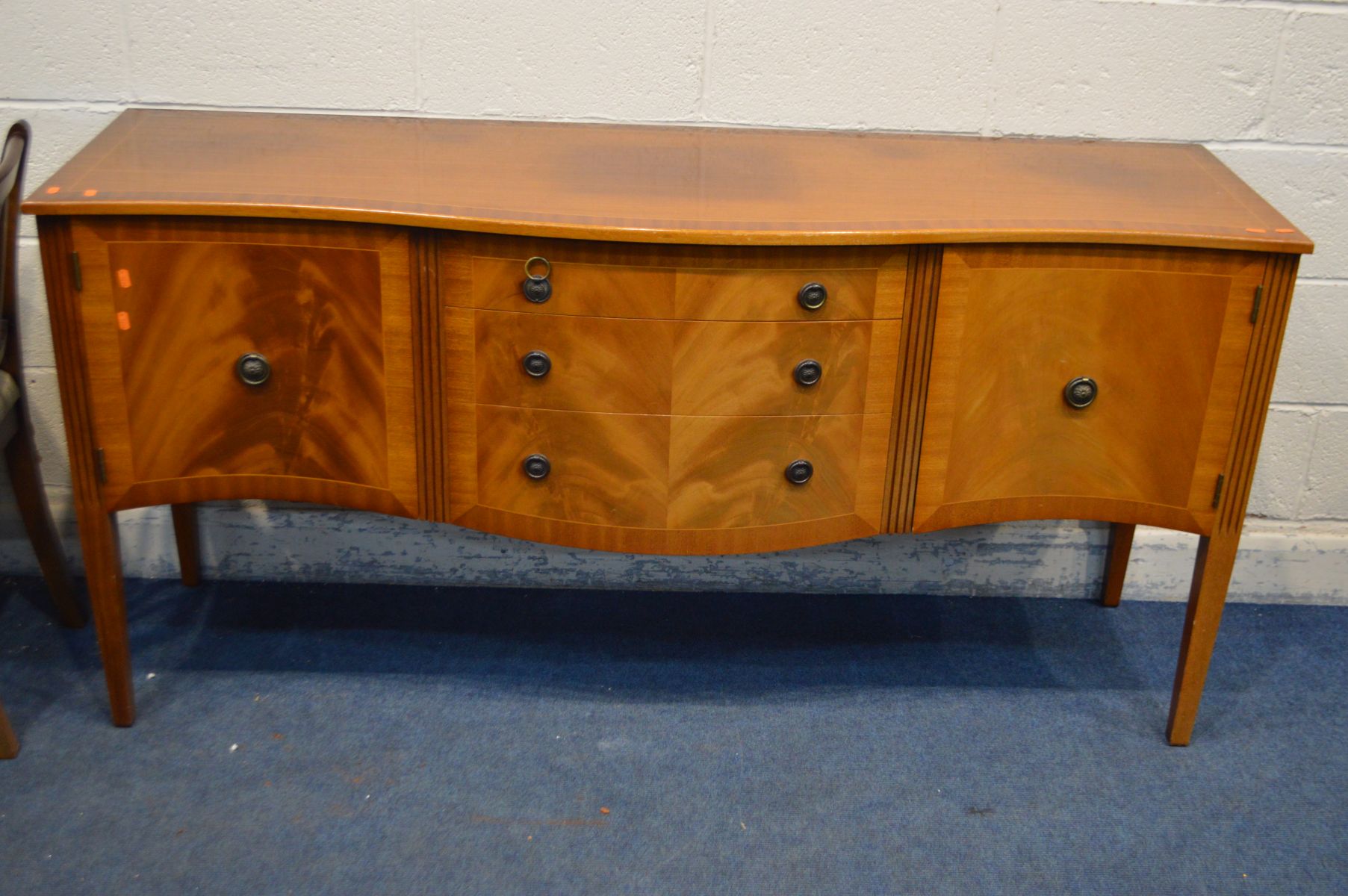 A MAHOGANY DINING TABLE, one additional leaf, four chairs and a serpentine sideboard (6) - Image 3 of 3