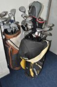 THREE GOLF BAGS containing various golf clubs to include Titan, The Masters Golf, Slazenger,