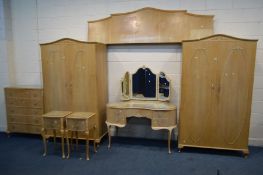 AN OLYMPUS BLEACHED WALNUT FRENCH STYLE FIVE PIECE BEDROOM SUITE, comprising two double door