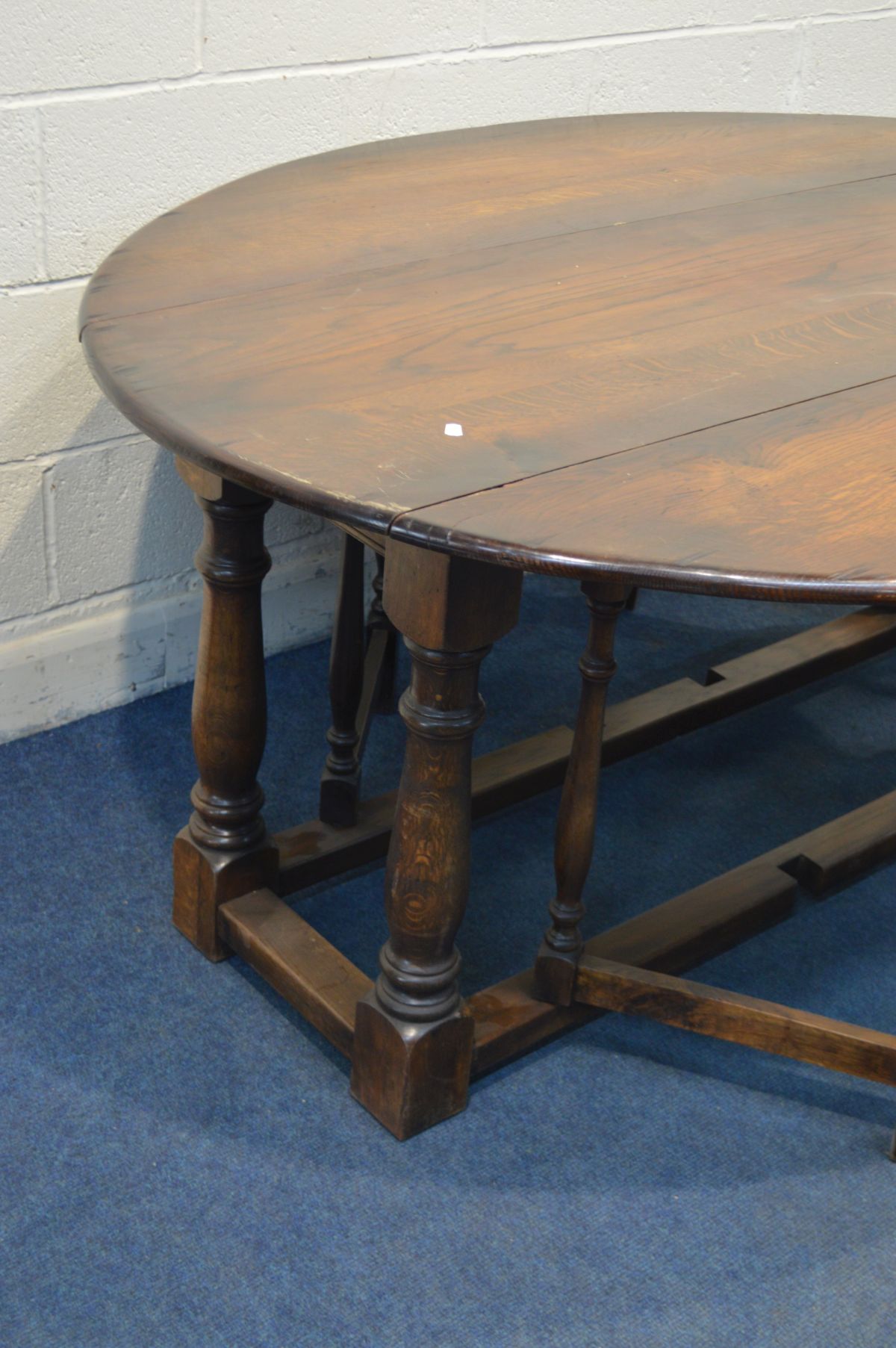 A 18TH CENTURY STYLE OAK WAKE TABLE, oval top with fall leaves, on turned and block legs, length - Image 2 of 5