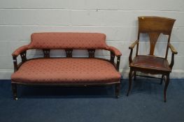 AN EDWARDIAN MAHOGANY SCROLLED BACK TWO SEATER ARMCHAIR, with a pierced back, length 141cm and a