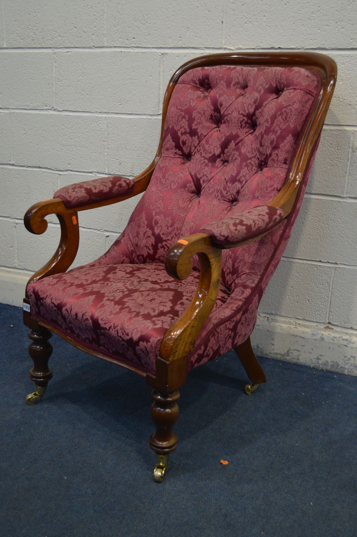 A VICTORIAN WALNUT OPEN ARMCHAIR with scrolled armrests, on turned front legs and brass casters, - Image 2 of 4