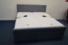 A GREY UPHOLSTERED 6FT ELECTRIC BED, with memory foam mattresses (both PAT pass and working, frame