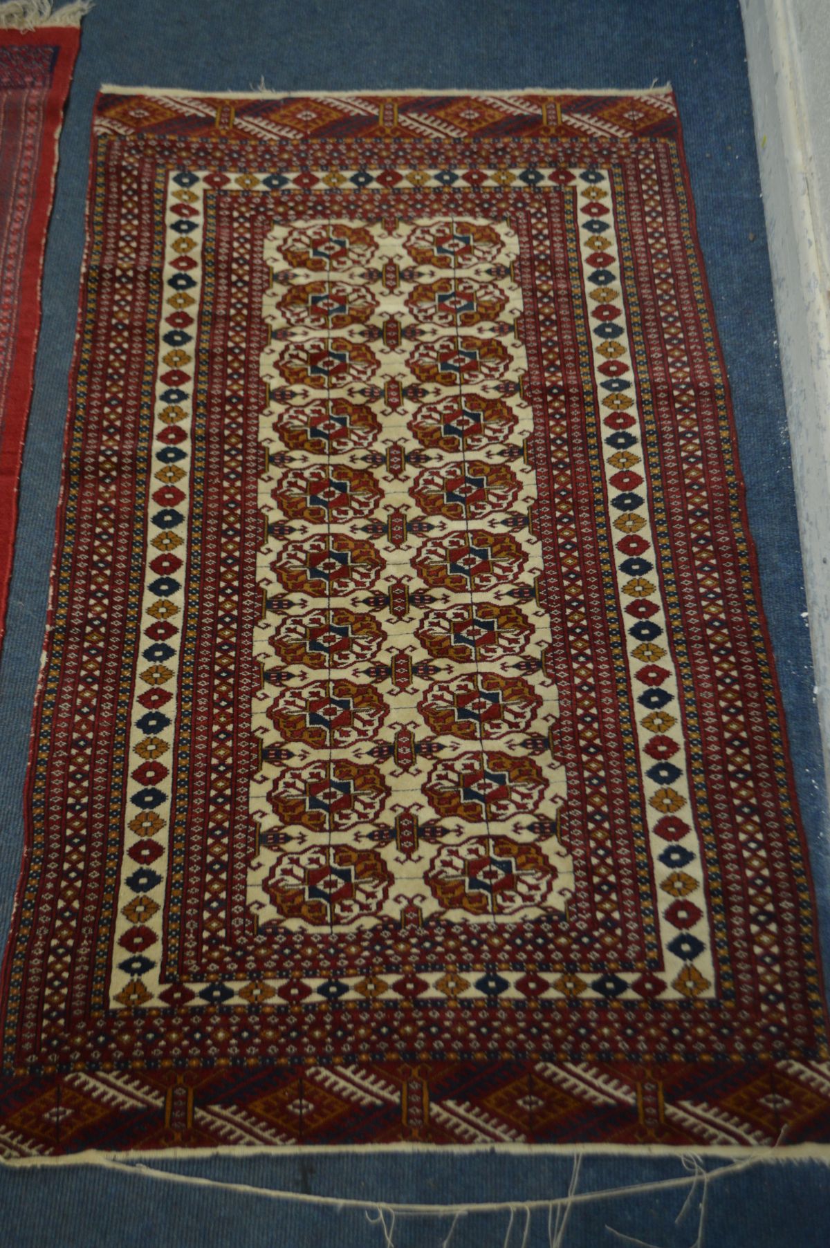A TURKOMAN TEKKE RED GROUND RUG, 207cm x 124cm - and a similar smaller rug, 161 cm x 94cm (2) - Image 3 of 4