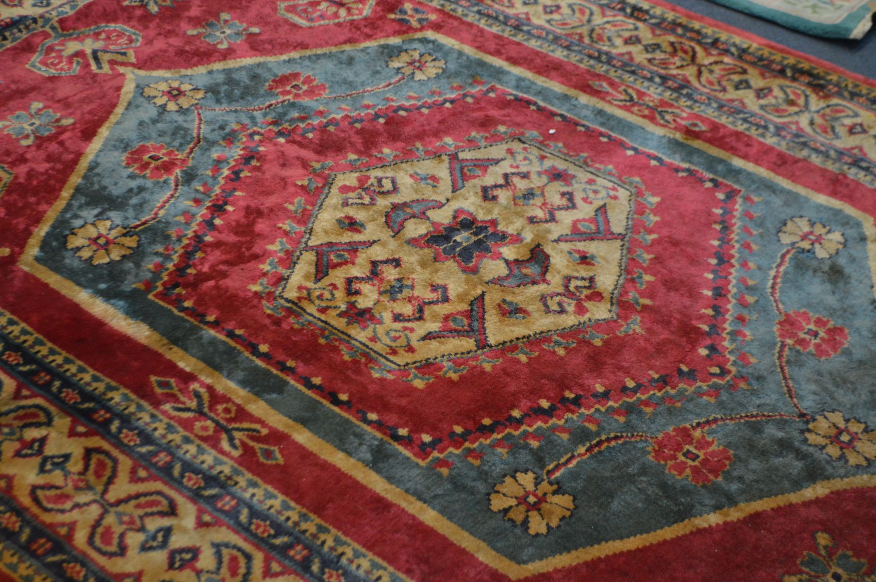 A WOOLLEN RED GROUND SARAB RUG, 276cm x 183cm (staining) and two Chinese rugs (3) - Image 3 of 5