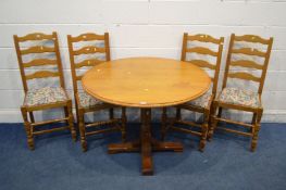 AN OAK CIRCULAR DINING TABLE, diameter 106cm x height 76cm and four ladder back chairs (5)