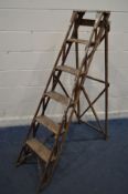 AN EARLY 20TH CENTURY FIVE RUNG STEP LADDER, similar to a Hatherley Lattistep, height 152cm (works
