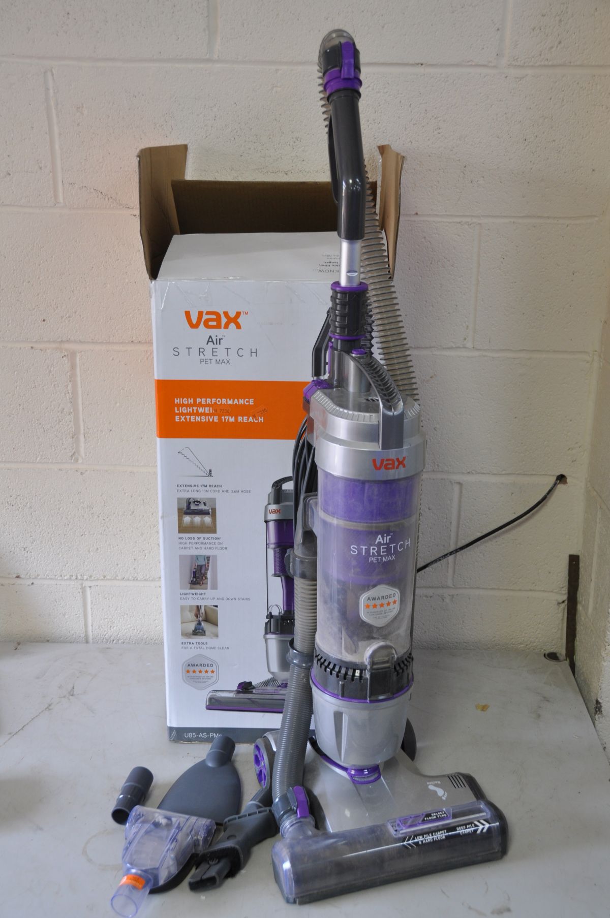 A VAX AIR STRETCH PET MAX VACUUM with four attachments (PAT pass and working)