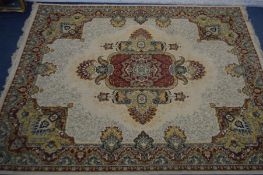 A LARGE LATE 20TH CENTURY WORSETED PILE FOLIATE CARPET SQUARE, cream and red field with a central