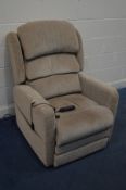 AN OATMEAL UPHOLSTERED PRIDE ELECTRIC RISE AND RECLINE ARMCHAIR (PAT pass and working)