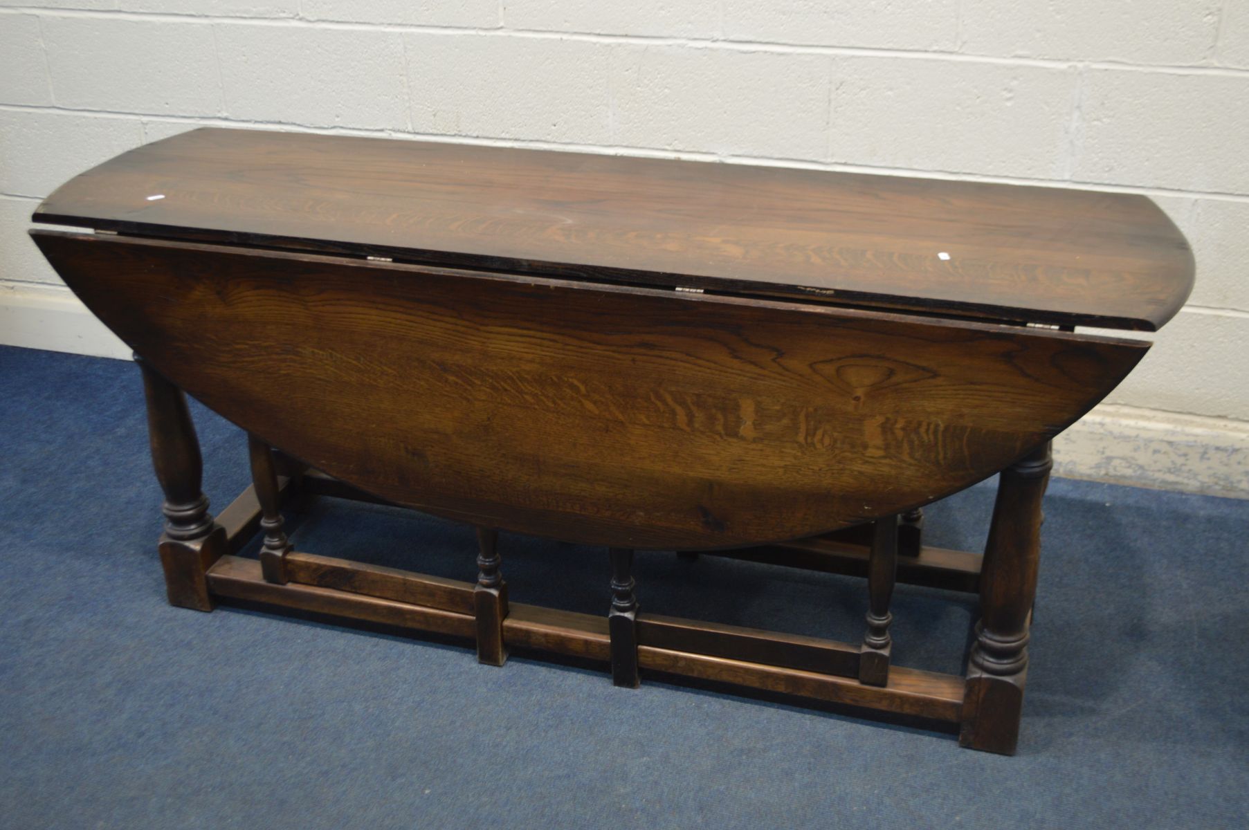 A 18TH CENTURY STYLE OAK WAKE TABLE, oval top with fall leaves, on turned and block legs, length - Image 5 of 5