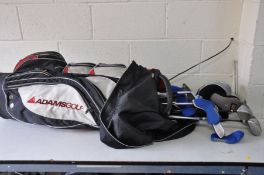 AN ADAMS GOLF BAG CONTAINING eight irons from Mizuno and Crane, two putters from The Golfers Club