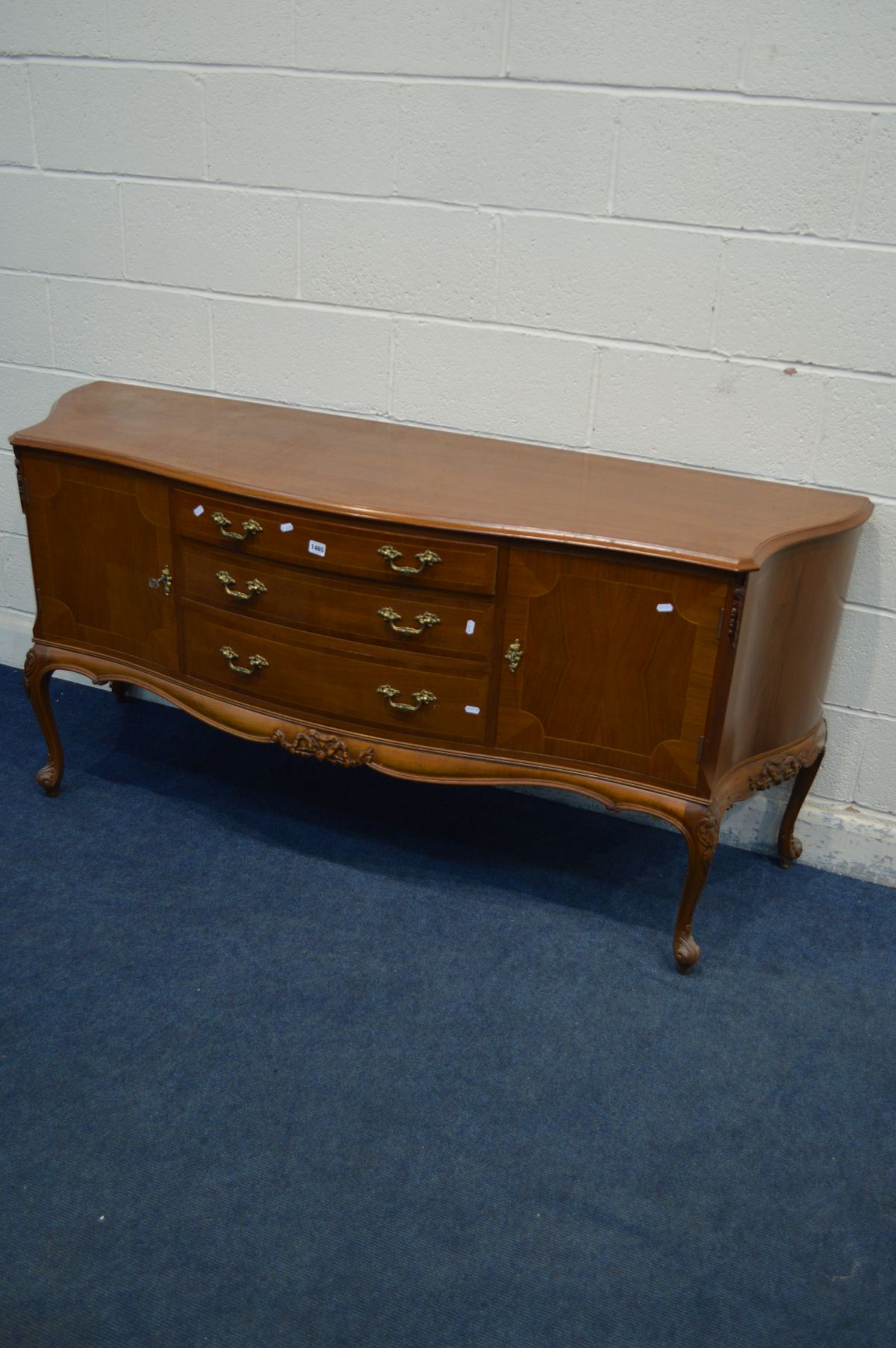 A REPRODUCTION BRIDGECRAFT MAHOGANY AND CROSSBANDED SERPENTINE SIDEBOARD, with two cupboard doors - Image 2 of 3