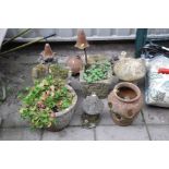 ELEVEN COMPOSITE GARDEN POTS AND ORNAMENTS including a Herb pot 32cm high, three planters, two