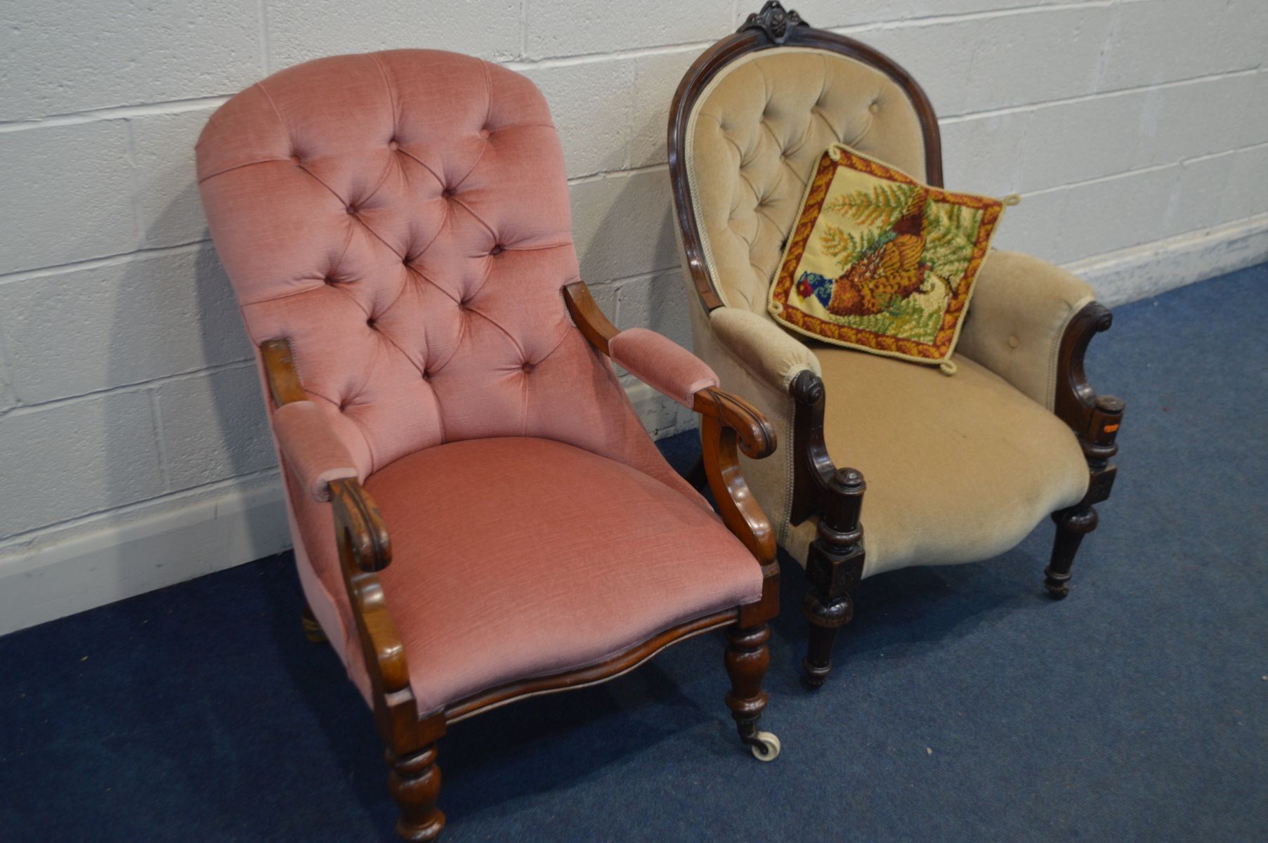 A VICTORIAN WALNUT UPHOLSTERED BUTTON BACK ARMCHAIR, with scrolled arm rest, on turned legs and - Image 2 of 3