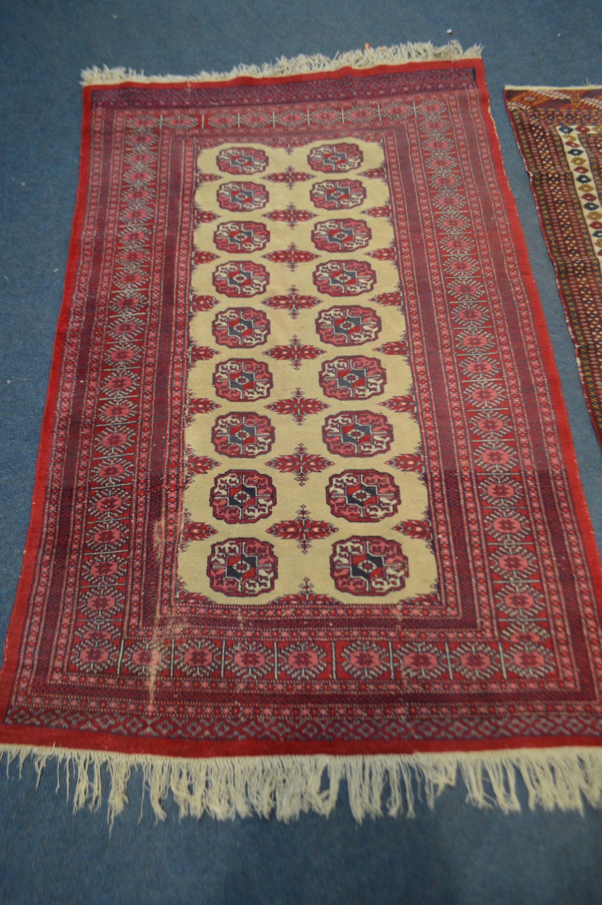 A TURKOMAN TEKKE RED GROUND RUG, 207cm x 124cm - and a similar smaller rug, 161 cm x 94cm (2) - Image 2 of 4