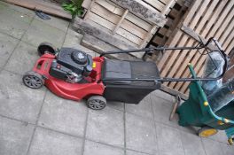 A MOUNTFIELD RS100 PETROL LAWN MOWER with grass box (engine pull freely but hasn't been started)