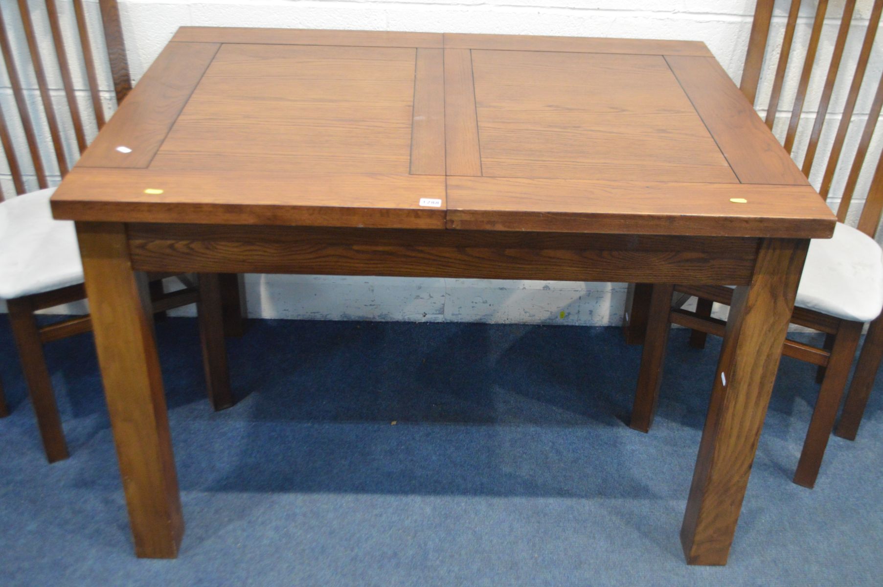 A MODERN OAK EXTENDING DINING TABLE, with a single leaf (leaf does not come out from under table - Image 3 of 3
