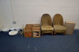 A PAIR OF LLOYD LOOM WICKER CHAIRS, and a linen basket, along with two wooden fruit crates,