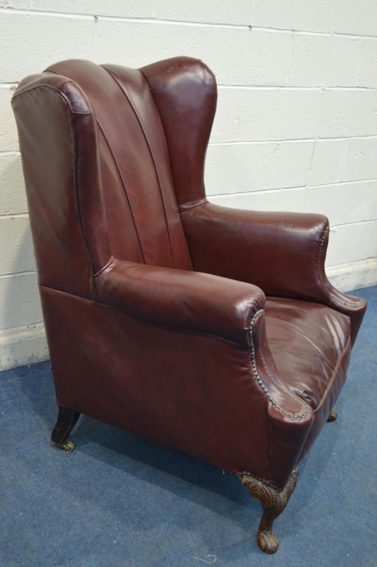 A GEORGE III GENTLEMANS ARMCHAIR, recovered in burgundy faux leather upholstery, sprung seat, on - Image 4 of 5