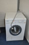 A MIELE NOVOTRONIC W310 WASHING MACHINE and a Kenwood Microwave ( both PAT pass and working) (2)