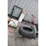 A VIRTUALLY NEW CONTINENTAL Conti Eco Contact EP 195/65 R15 91T tyre, a wheel barrow, a folding