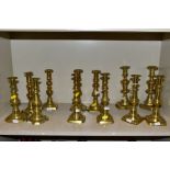 SIX NEAR PAIRS OF BRASS CANDLESTICKS, tallest height 21.5cm (12)