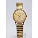 A GENTS 9CT GOLD 'ACCURIST' WRISTWATCH, hand wound movement, discoloured silver dial signed '