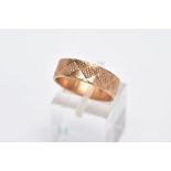 A 9CT GOLD WIDE BAND, textured band, approximate width 5.9mm, hallmarked 9ct gold, engraved to the