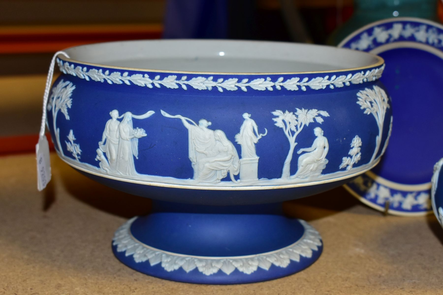 THREE PIECES OF WEDGWOOD BLUE JASPERWARE, comprising a pedestal fruit bowl, the applied decoration - Image 7 of 9