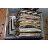 A PLASTIC BOX CONTAINING OVER ONE HUNDRED LPs, 12IN AND 7IN SINGLES including Rubber Soul (poor),