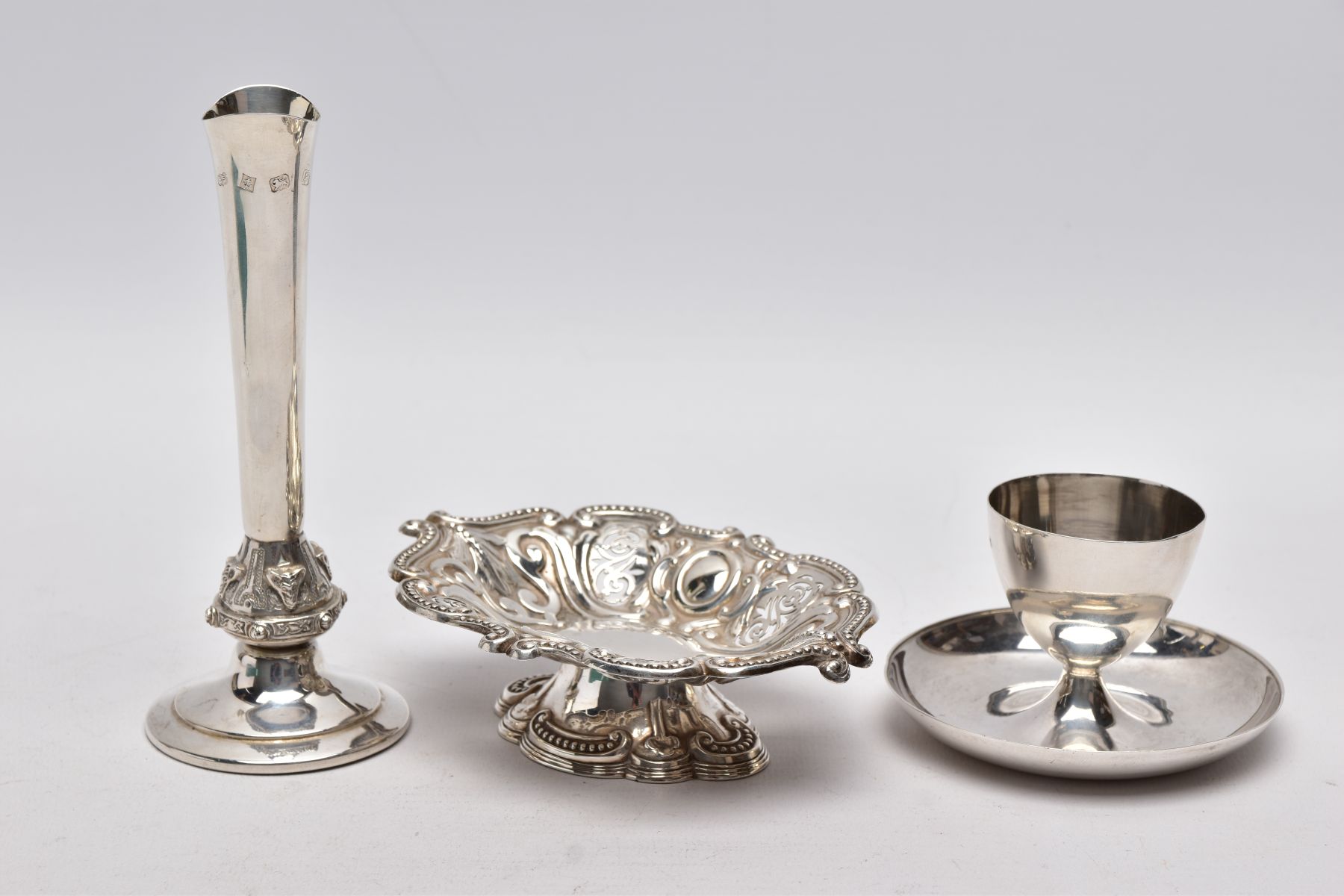 A SILVER EGG CUP, BONBON DISH AND A POSY VASE, the egg cup of a plain polished design fitted on a