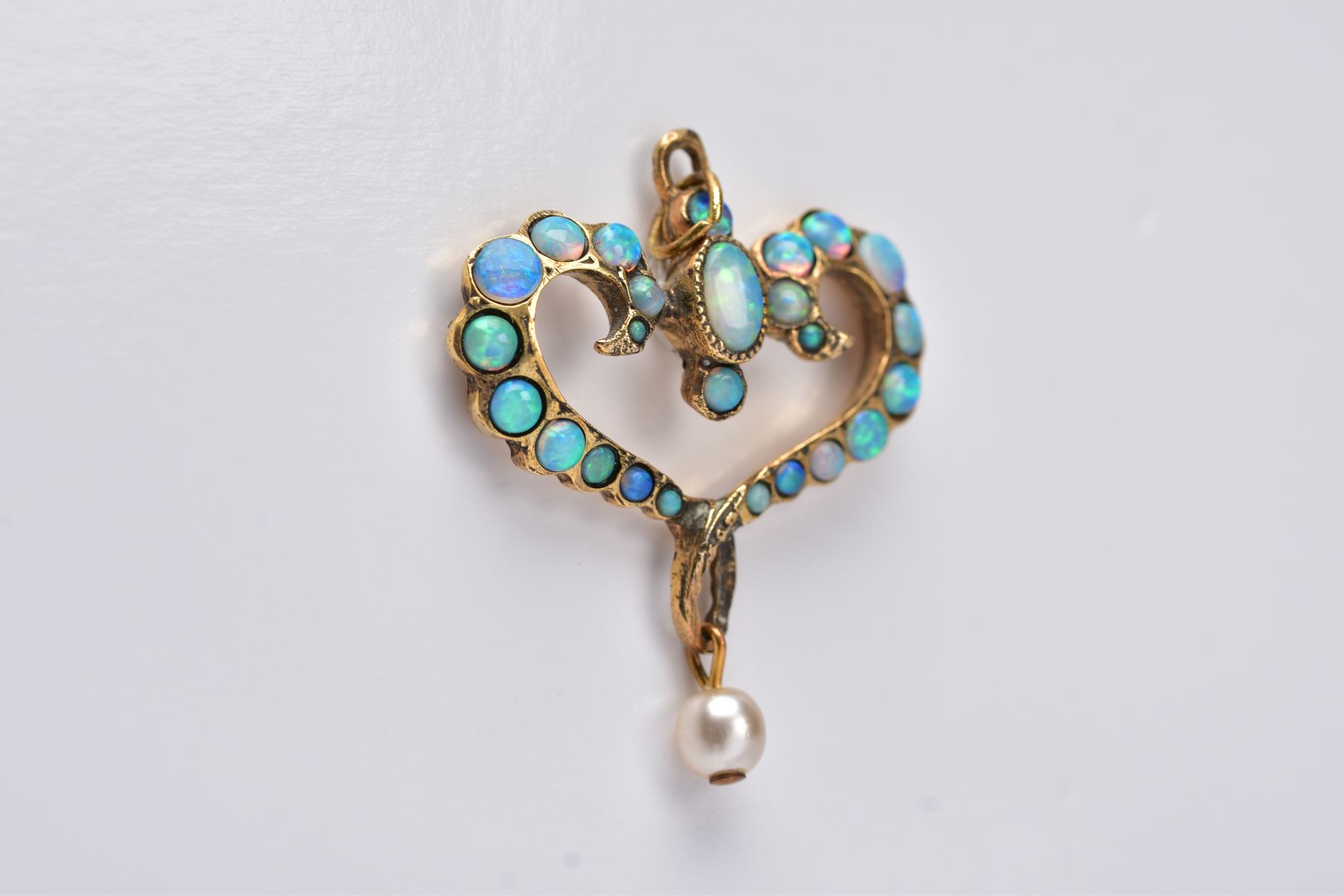 AN OPAL PENDANT, of an openwork heart form, set with oval and circular cut cabochon opals, - Image 2 of 5