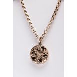 A ROSE GOLD OPENWORK LOCKET PENDANT NECKLET, the pendant of a circular form, openwork floral design,