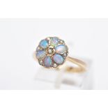 A MODERN 9CT GOLD OPAL AND SPLIT PEARL CLUSTER RING, designed with oval cabochon opals and split