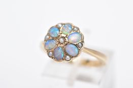 A MODERN 9CT GOLD OPAL AND SPLIT PEARL CLUSTER RING, designed with oval cabochon opals and split