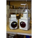 TWO BRITISH RAILWAY TAIL LAMPS, white painted metal bodies with red bullseye lenses, one marked B.R.