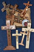 A BOX OF WOODEN CRUCIFIXES, together with rosary beads and religious medallions