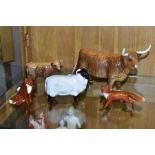 TWO BESWICK HIGHLAND CATTLE, a Cow No 1740 and a Calf No 1827D, both gloss, together with a Black